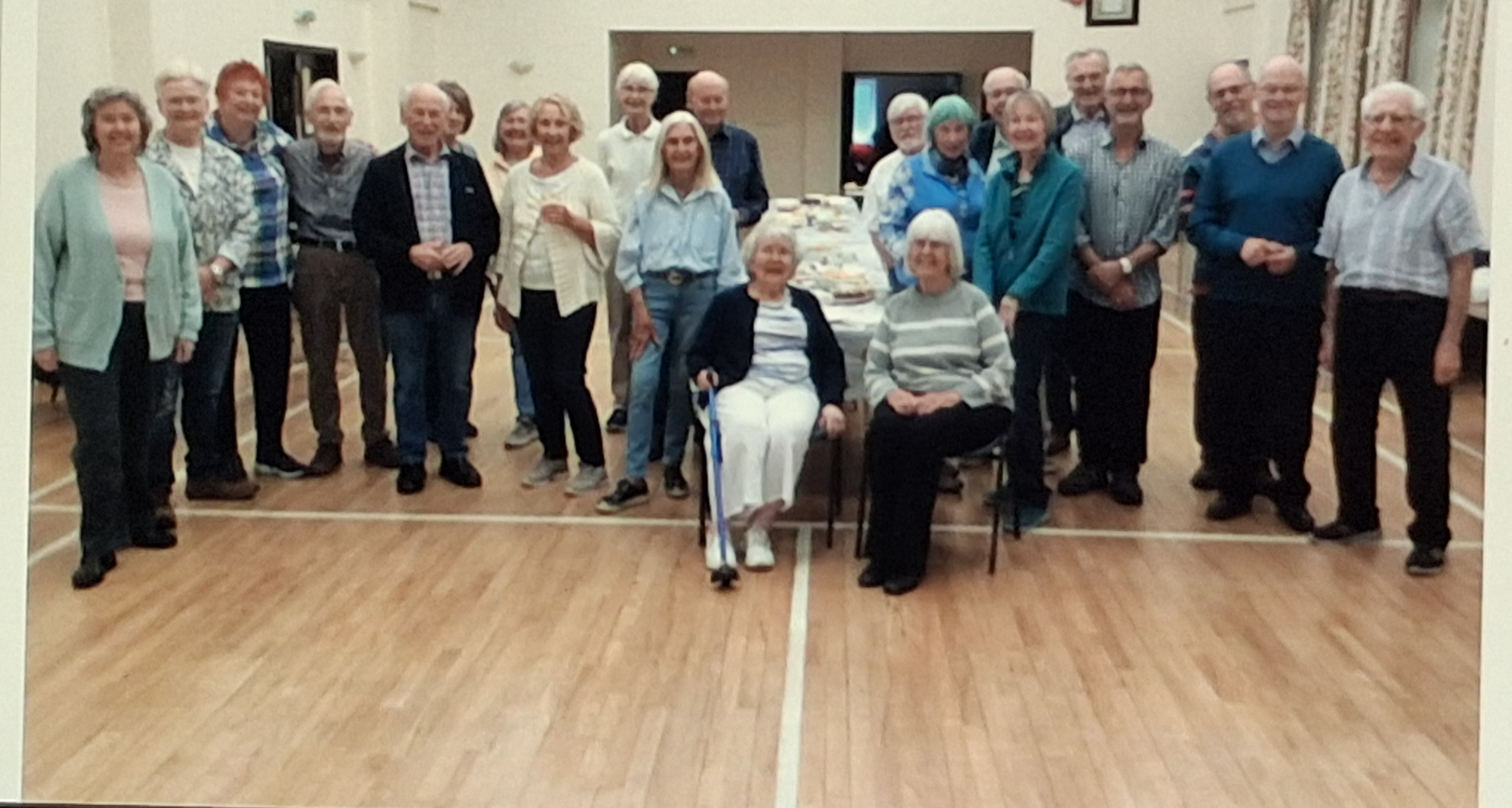 Chobham Art Group members gathered for a group photograph in a hall
